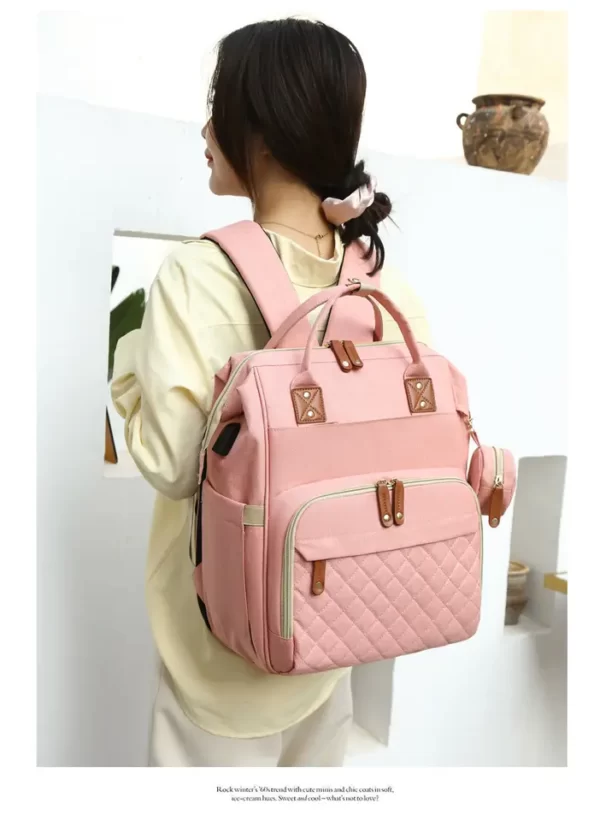 Travel bag for baby essentials with bed